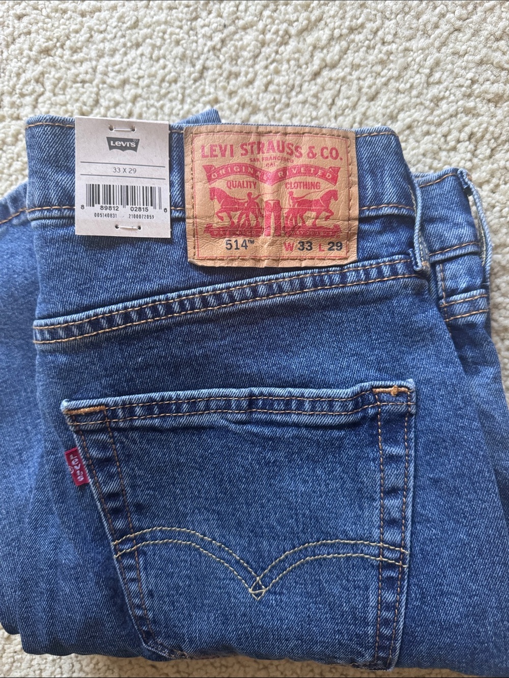 Levi's Women's Straight Leg Jeans in Blue with Tan Patch